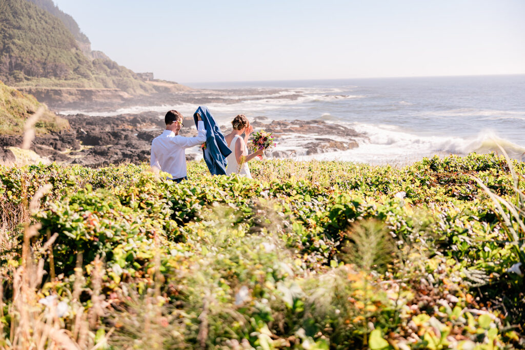 A newly married couple explores the coast on a sunny Oregon Wedding Day. 